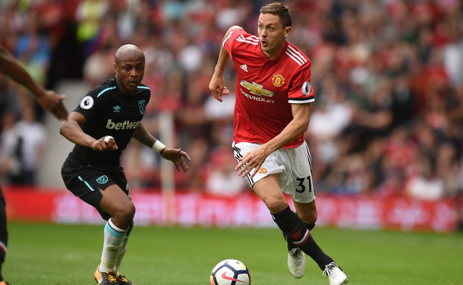 Manchester United's new signing Nemanja Matic played his match at Old Trafford in Manchester United colours against West Ham United. AFP Manchester United's new signing Nemanja Matic played his match at Old Trafford in Manchester United colours against West Ham United. AFP