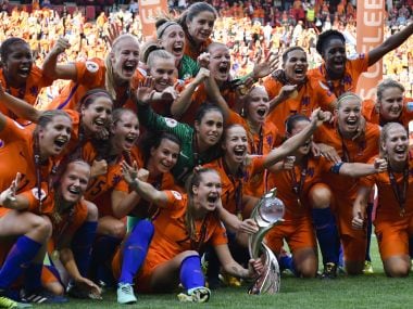 Dutch players celebrate with the trophy after defeating Denmark in the Women's Euro 2017 final. AP