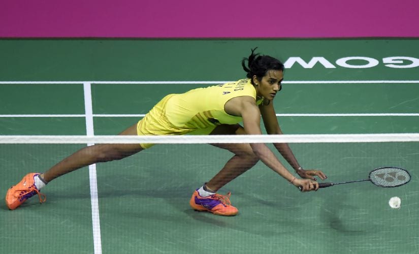 PV Sindhu lunges for a return against Nozomi Okuhara during their women's singles final at 2017 World Championships. AFP