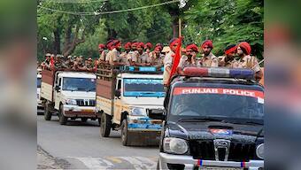 Ram Rahim rape verdict: Police teams prepare for war as thousands of supporters descend on Panchkula