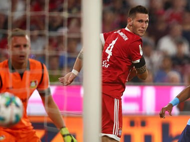 Soccer Football - Bundesliga - Bayern Munich vs Bayer Leverkusen - Munich, Germany - August 18, 2017 Bayern Munich's Niklas Sule scores their first goal REUTERS/Michael Dalder DFL RULES TO LIMIT THE ONLINE USAGE DURING MATCH TIME TO 15 PICTURES PER GAME. IMAGE SEQUENCES TO SIMULATE VIDEO IS NOT ALLOWED AT ANY TIME. FOR FURTHER QUERIES PLEASE CONTACT DFL DIRECTLY AT + 49 69 650050 - RTS1CDC4