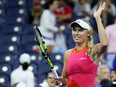 Aug 28, 2017; New York, NY, USA; Caroline Wozniacki of Denmark salutes the crowd after her match against Mihaela Buzemescu of Romania (not pictured) on day one of the U.S. Open tennis tournament at USTA Billie Jean King National Tennis Center. Mandatory Credit: Geoff Burke-USA TODAY Sports - RTX3DRB9