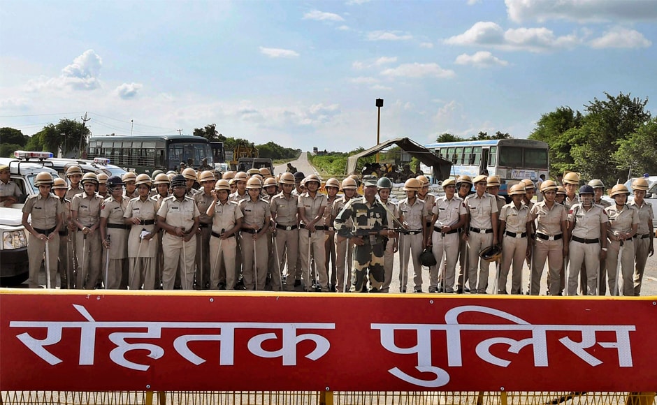 Security personnel keeping strict vigil near Sunariya Jail, where Dera Sacha Sauda chief Gurmeet Ram Rahim Singh’s quantum of sentence was pronounced, in Rohtak on Monday. A special CBI court sentenced him to 20 years in prison for the two separate rape cases against him. PTI Security personnel keeping strict vigil near Sunariya Jail, where Dera Sacha Sauda chief Gurmeet Ram Rahim Singh’s quantum of sentence was pronounced, in Rohtak on Monday. A special CBI court sentenced him to 20 years in prison for the two separate rape cases against him. PTI