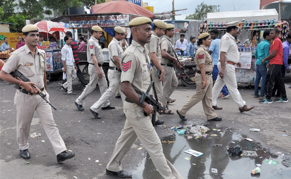 Police personnel continued to keep a vigil near the New Delhi Railway Station on Monday. Several places have been kept under curfew and prohibitory orders even after the sentence was announced. PTI Police personnel continued to keep a vigil near the New Delhi Railway Station on Monday. Several places have been kept under curfew and prohibitory orders even after the sentence was announced. PTI