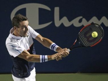 Roberto Bautista Agut, of Spain, returns a shot against Jan-Lennard Struff, of Germany, during a semifinal of the Winston-Salem Open tennis tournament in Winston-Salem, N.C., Friday, Aug. 25, 2017. (AP Photo/Chuck Burton)