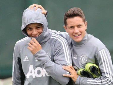 Manchester United defender Marcus Rojo was spotted training with first team. Image Courtesy: Twitter @ManUtd