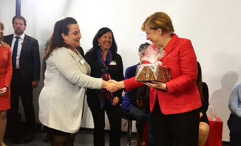 Salma Alarmachi, co-founder Jasmin Catering, meeting German Chancellor Angela Merkel Image courtesy: Jasmin Catering Facebook Page