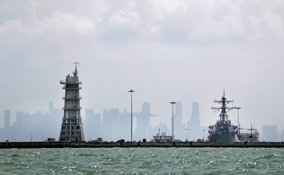 USS John S McCain was escorted back to Singapore and was seen docked at the Changi Naval Base on Monday afternoon. AP USS John S McCain was escorted back to Singapore and was seen docked at the Changi Naval Base on Monday afternoon. AP