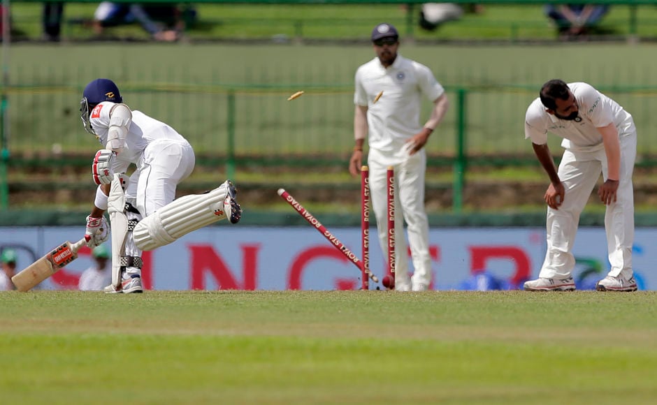 After Ashwin's wayward throw from mid on missed the stumps, Kuldeep Yadav who was backing up unleashed a rocket-throw to catch Kusal Mendis short of the popping crease. AP After Ashwin's wayward throw from mid on missed the stumps, Kuldeep Yadav who was backing up unleashed a rocket-throw to catch Kusal Mendis short of the popping crease. AP