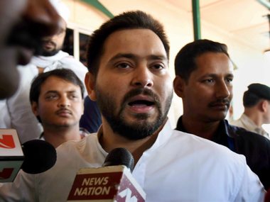 Tejashwi Yadav takes a dig at Nitish Kumar over 'tainted' new Bihar govt Tejashwi Yadav takes a dig at Nitish Kumar over 'tainted' new Bihar govt
