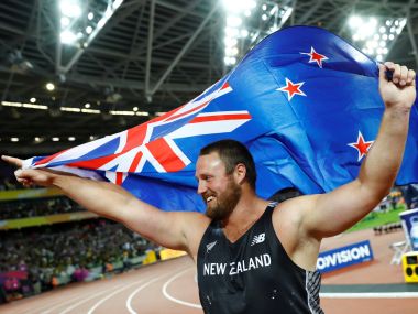 Tomas Walsh of New Zealand celebrates after winning the mens shot put final. Reuters