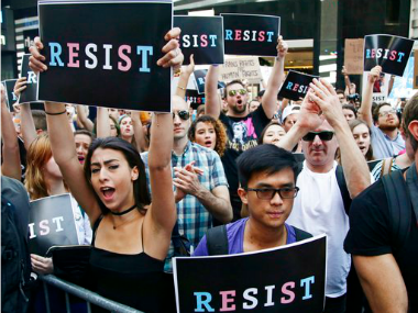 After Donald Trump's rally in Phoenix, protesters turns violent; police fires tear gas After Donald Trump's rally in Phoenix, protesters turns violent; police fires tear gas