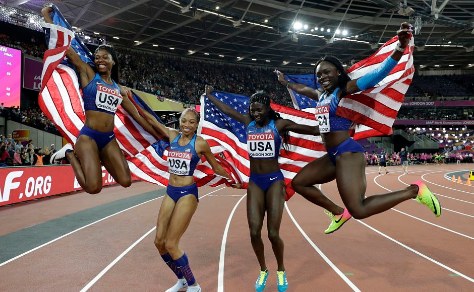 The United States' 4x100m relay team (Aaliyah Brown, Allyson Felix, Tori Bowie and Morolake Akinosun) celebrate after winning the gold. The team set a new world level with a time of 41.82 seconds to win the title to add on to their Rio Olympic gold. AP The United States' 4x100m relay team (Aaliyah Brown, Allyson Felix, Tori Bowie and Morolake Akinosun) celebrate after winning the gold. The team set a new world level with a time of 41.82 seconds to win the title to add on to their Rio Olympic gold. AP