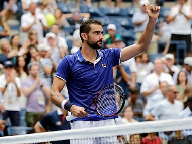 Marin Cilic, of Croatia, waves to spectators after defeating Tennys Sandgren, of the United States, during the first round of the U.S. Open tennis tournament, Monday, Aug. 28, 2017, in New York. (AP Photo/Seth Wenig)