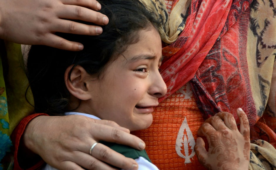 Zohra, daughter of deceased police officer Abdul Rasheed, who was killed in a shootout with suspected rebels, during the funeral at the police headquarters in Srinagar on Monday. PTI Zohra, daughter of deceased police officer Abdul Rasheed, who was killed in a shootout with suspected rebels, during the funeral at the police headquarters in Srinagar on Monday. PTI