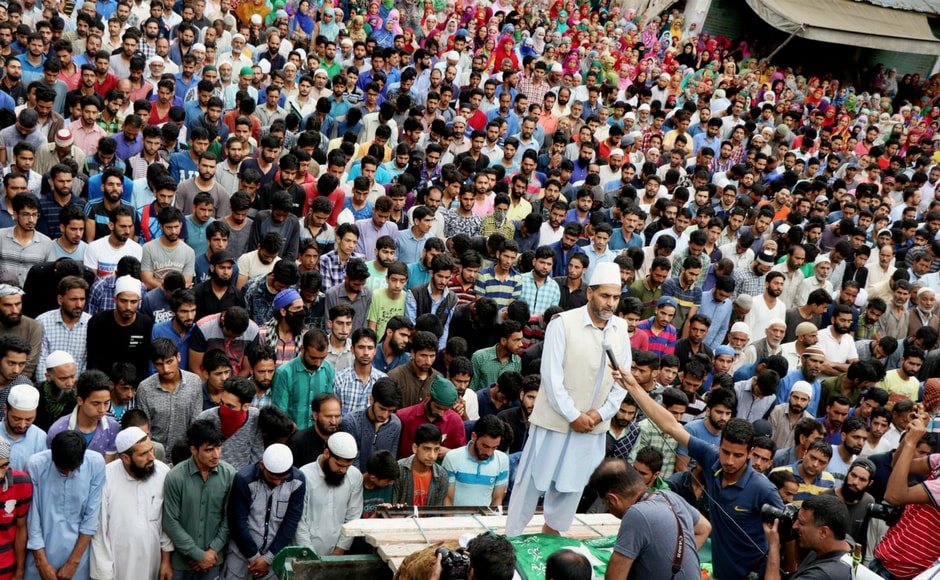 People offering funeral prayers for a civilian who was killed during Tuesday's clashes between security forces and protesters following the killing of LeT commander Abu Dujana, at Gabarpora village of Pulwama district on Wednesday. PTI People offering funeral prayers for a civilian who was killed during Tuesday's clashes between security forces and protesters following the killing of LeT commander Abu Dujana, at Gabarpora village of Pulwama district on Wednesday. PTI