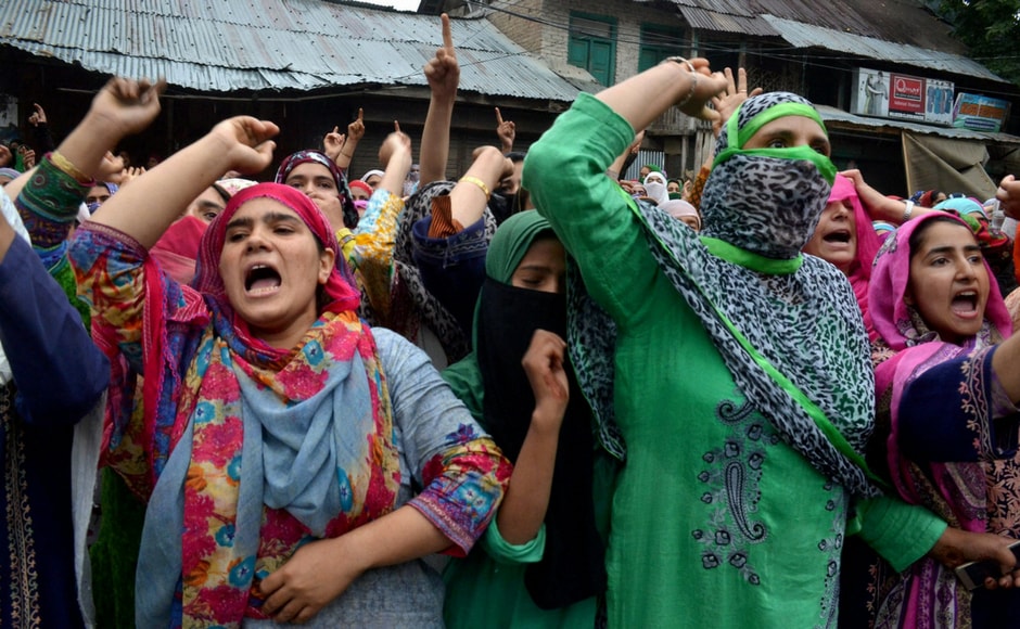 Women protesters in Srinagar on Wednesday. PTI Women protesters in Srinagar on Wednesday. PTI