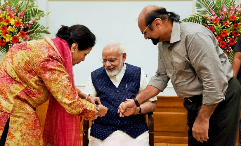 Widows from Vrindavan would tie rakhi on Prime Minister Narendra Modi's wrist in Delhi on Monday on the occasion of Rakshabandhan that celebrates the brother-sister bond. PTI Widows from Vrindavan would tie rakhi on Prime Minister Narendra Modi's wrist in Delhi on Monday on the occasion of Rakshabandhan that celebrates the brother-sister bond. PTI
