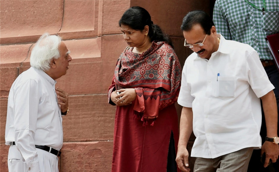 Congress leaders Kapil Sibal , DMK MP Kanimozhi and Statistics Minister DV Sadananda Gowda during the ongoing monsoon session of Parliament, in New Delhi on Thursday. PTI Congress leaders Kapil Sibal , DMK MP Kanimozhi and Statistics Minister DV Sadananda Gowda during the ongoing monsoon session of Parliament, in New Delhi on Thursday. PTI