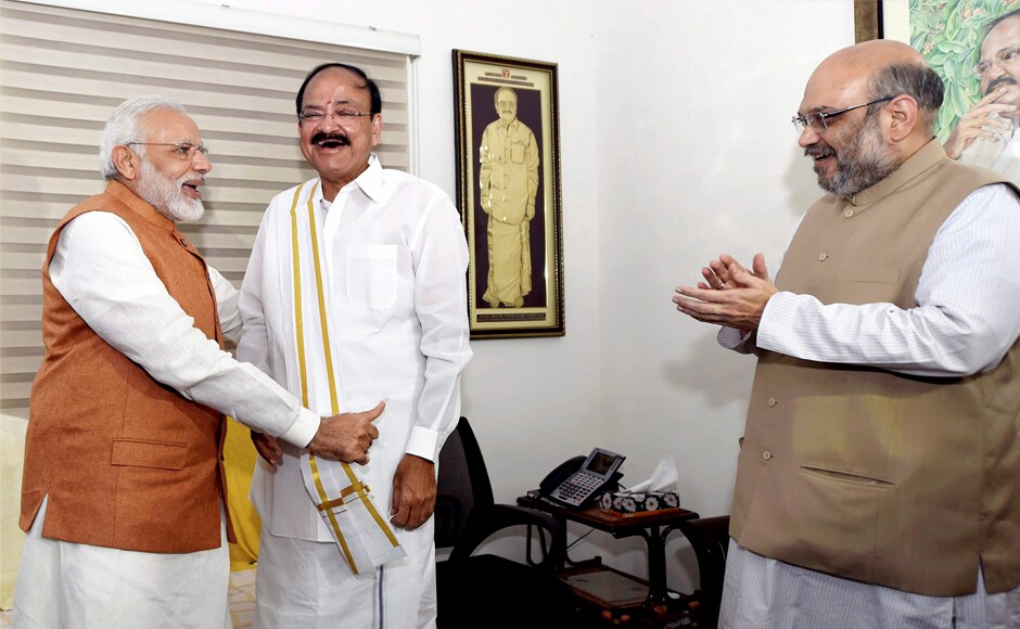Prime Minister Narendra Modi and BJP president Amit Shah greet Vice-President-elect Venkaiah Naidu at his residence in New Delhi on Saturday. Although 785 MPs were eligible to vote in the election, 14 MPs could not vote. PTI Prime Minister Narendra Modi and BJP president Amit Shah greet Vice-President-elect Venkaiah Naidu at his residence in New Delhi on Saturday. Although 785 MPs were eligible to vote in the election, 14 MPs could not vote. PTI