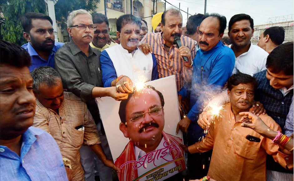 BJP workers celebrate the victory of NDA candidate Venkaiah Naidu's victory, in Bhopal on Saturday. PTI BJP workers celebrate the victory of NDA candidate Venkaiah Naidu's victory, in Bhopal on Saturday. PTI