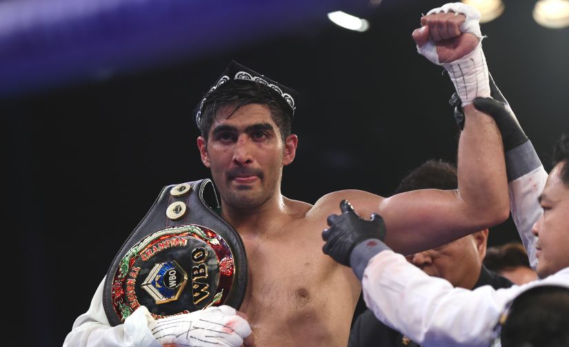 Indian boxer and WBO Asia-Pacific Super Middleweight champion Vijender Singh celebrates after winning the double title bout against China's Zulpikar Maimaitiali at the National Sports Complex of India (NSCI) Dome in Mumbai. AFP