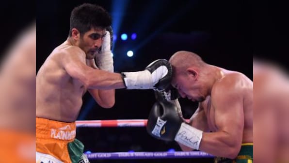 Battleground Asia: Vijender Singh clinches double title after surviving close bout against Zulpikar Maimaitiali