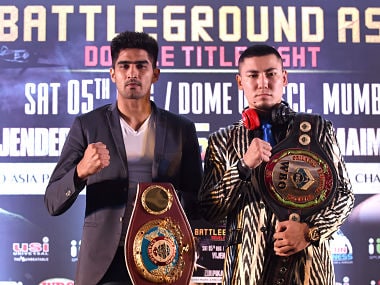 WBO Asia-Pacific Super Middleweight champion Vijender Singh and his competitor WBO Oriental Super Middleweight champion Zulpikar Maimaitiali. AFP