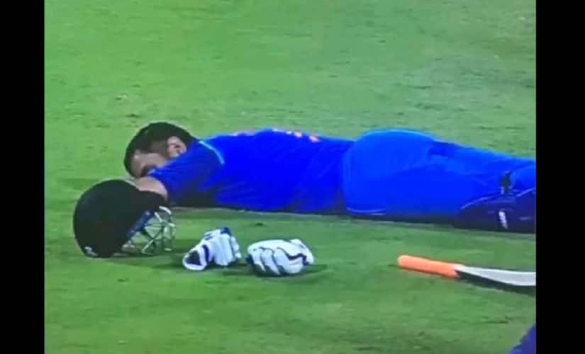 MS Dhoni takes a nap on the field during third ODI match against Sri Lanka. Youtube screen grab.