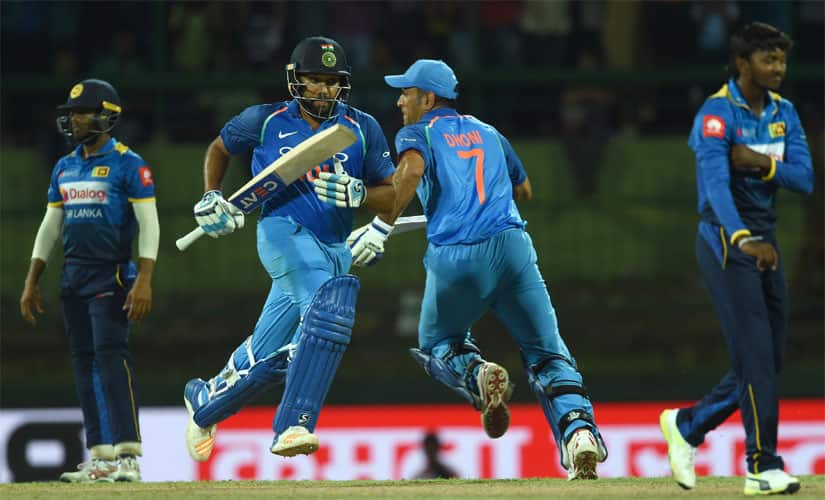 India’s Rohit Sharma (second from left) and MS Dhoni run between the wickets during the 3rd ODI against Sri Lanka. AFP