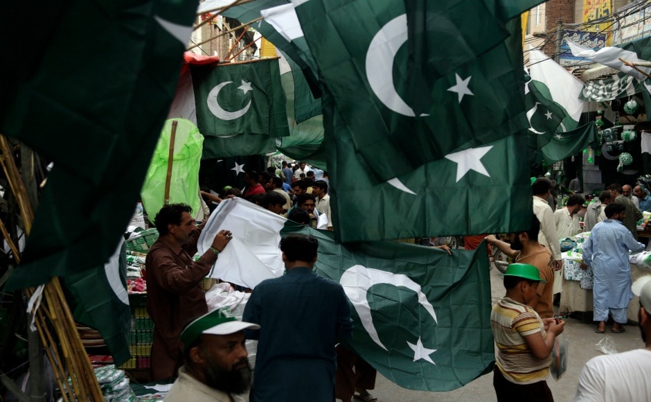 National flags are seen hanging on Pakistan's streets as it celebrates the 70th year of gaining independence from the British rule on 14 August. AP National flags are seen hanging on Pakistan's streets as it celebrates the 70th year of gaining independence from the British rule on 14 August. AP