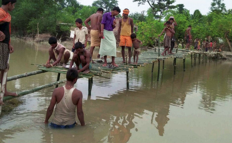 Residents in Bihar are struggling to recover from the devastation caused by floods and landslides that have killed 341 people, destroyed crops and swept away houses and roads. PTI Residents in Bihar are struggling to recover from the devastation caused by floods and landslides that have killed 341 people, destroyed crops and swept away houses and roads. PTI