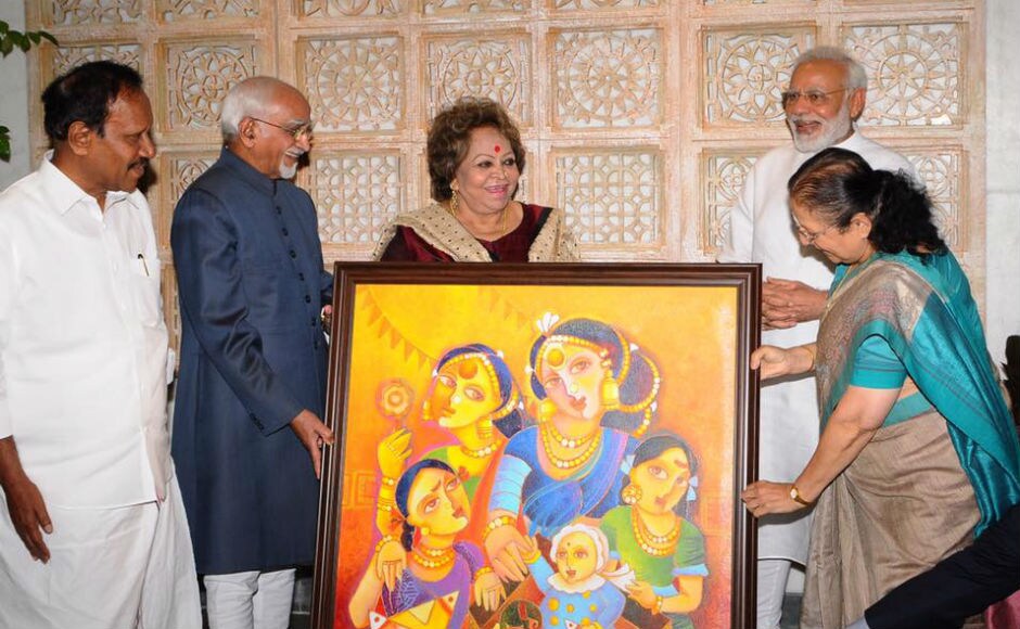 Mahajan presented a painting for Ansari, and gifted a memento to his wife Salma. Twitter/@narendramodi Mahajan presented a painting for Ansari, and gifted a memento to his wife Salma. Twitter/@narendramodi