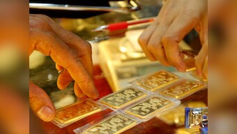Gold crosses Rs 33,000-mark per 10 gram on weak rupee, firm overseas trend; silver rises Rs 410 as local demand up