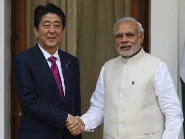 Shinzo Abe with Narendra Modi. Reuters