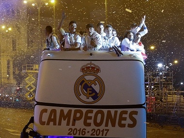 Real Madrid players celebrating their title-winning run at the end of last season. Reuters