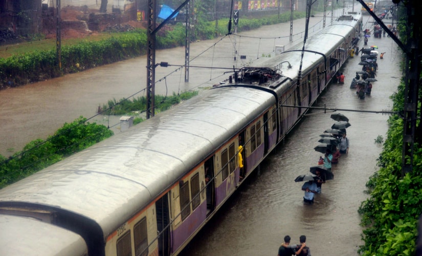 Trains were running late or stopped on Central, North and Harbour railway lines, as tracks were submerged at several places. PTI Trains were running late or stopped on Central, North and Harbour railway lines, as tracks were submerged at several places. PTI