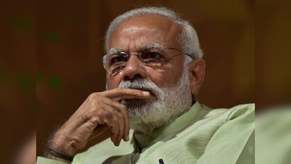 Panneerselvam meets Narendra Modi; discuss possible merger of AIADMK factions
