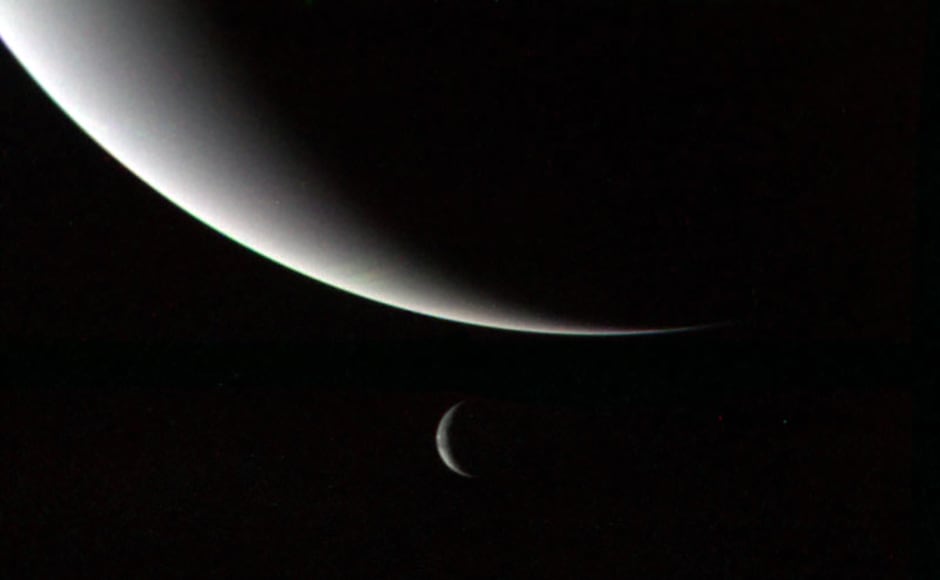 Neptune and Triton. Image: NASA. Neptune and Triton. Image: NASA.