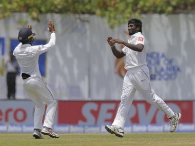 Sri Lanka's Nuwan Pradeep, center, celebrates the dismissal of India's Ravichandran Ashwin, right, during the second day's play of the first test cricket match between India and Sri Lanka in Galle, Sri Lanka, Thursday, July 27, 2017. (AP Photo/Eranga Jayawardena)