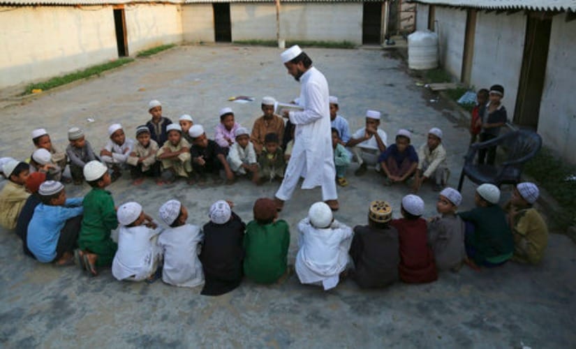 File image of Rohingya refugee children attending a Madrassa in a temporary shelter on the outskirts of Jammu. AP