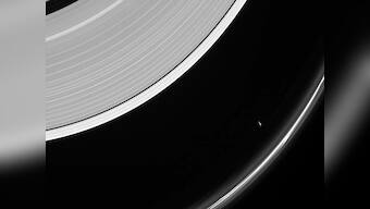 NASA's Cassini spacecraft captures an image of Saturn's moon Prometheus near the F Ring