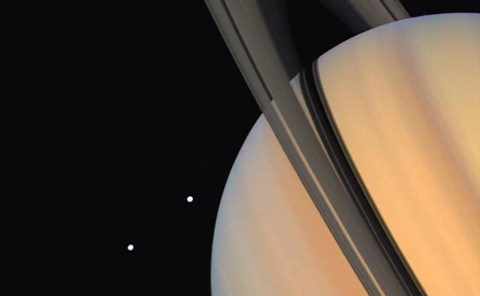 Saturn with Dione and Tethys. Image: NASA. Saturn with Dione and Tethys. Image: NASA.