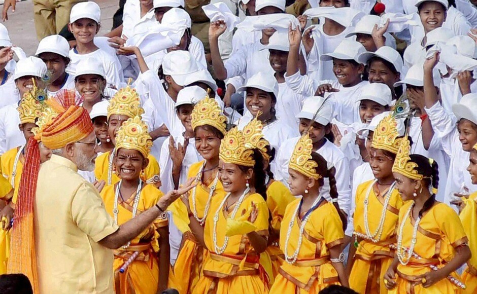 After the speech, Narendra Modi interacted with school children dressed as Lord Krishna to mark the coinciding festival of Janmashtami. PTI After the speech, Narendra Modi interacted with school children dressed as Lord Krishna to mark the coinciding festival of Janmashtami. PTI
