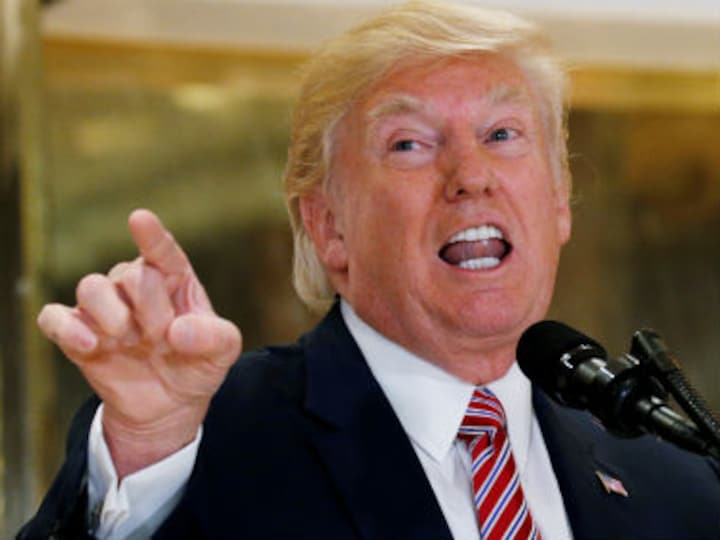Donald Trump signs memo banning transgender recruits US military, invites heavy criticism from Democrats