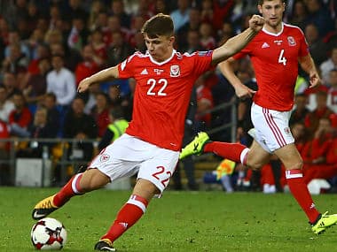 Wales' striker Ben Woodburn shoots to score his team's first goal during their FIFA World Cup 2018 qualifier against Austria. AFP