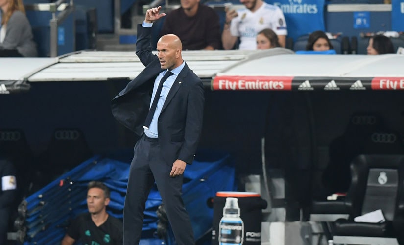 Real Madrid's coach from France Zinedine Zidane gestures during the Spanish league football match Real Madrid CF against Real Betis at the Santiago Bernabeu stadium in Madrid on September 20, 2017. / AFP PHOTO / GABRIEL BOUYS