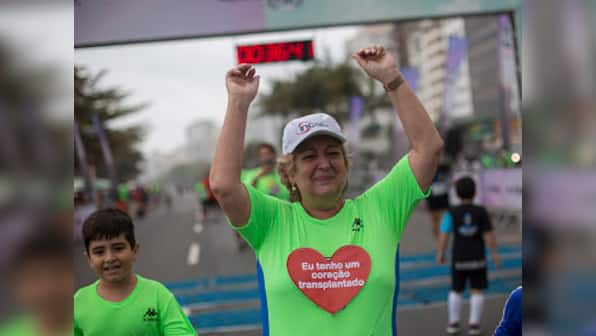 Brazilian with transplanted heart from German Olympian participates in road race in Rio de Janeiro