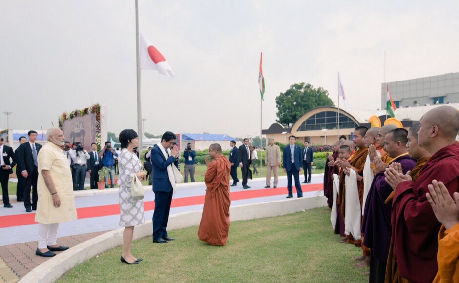 After being greeted by a group of Buddhist monks, the leaders embarked on an eight-kilometre-long roadshow from the airport to the Sabarmati Aashram. Twitter@RaveeshKumar After being greeted by a group of Buddhist monks, the leaders embarked on an eight-kilometre-long roadshow from the airport to the Sabarmati Aashram. Twitter@RaveeshKumar