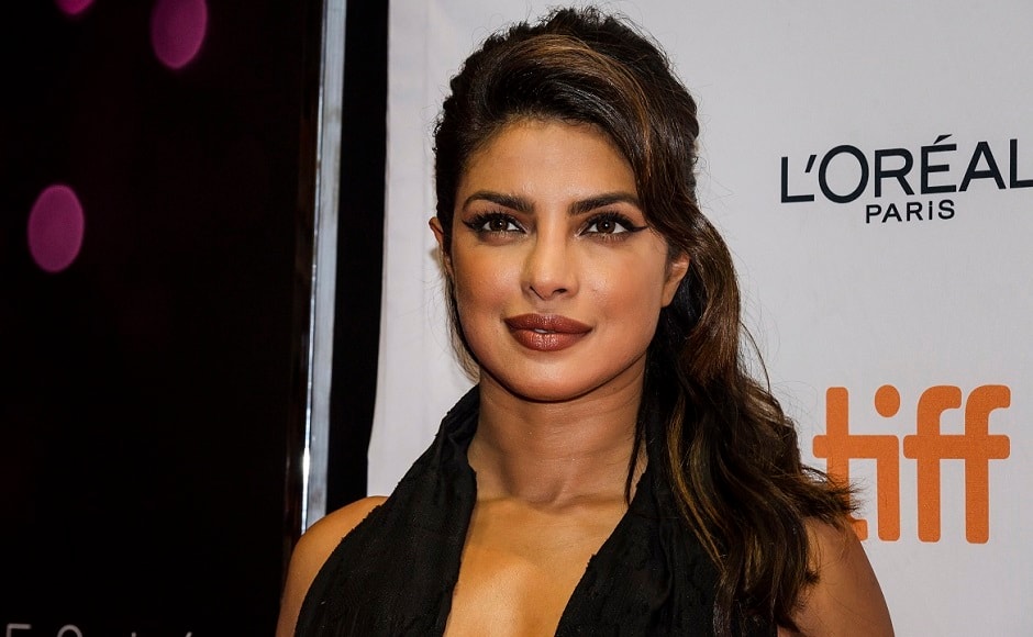 Priyanka Chopra poses on the red carpet before the TIFF Soiree in Toronto on Wednesday, Sept. 6, 2017. (Christopher Katsarov/The Canadian Press via AP)